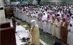 A congregation of people in prayer in masjid haram