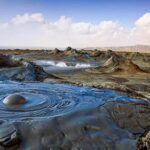 Witness the unique landscapes of the mud volcanoes