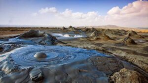 Witness the unique landscapes of the mud volcanoes