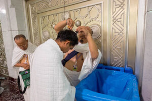 pilgrim getting his hair shaved or trimmed